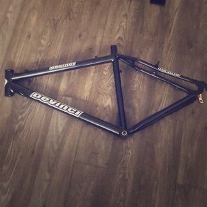 A repainted Black Devinci bike frame